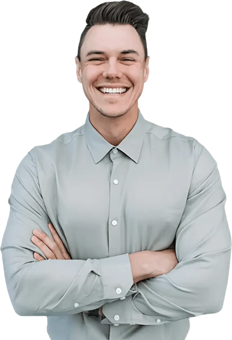 Alex Thomson, Penticton mortgage broker, smiling with arms crossed